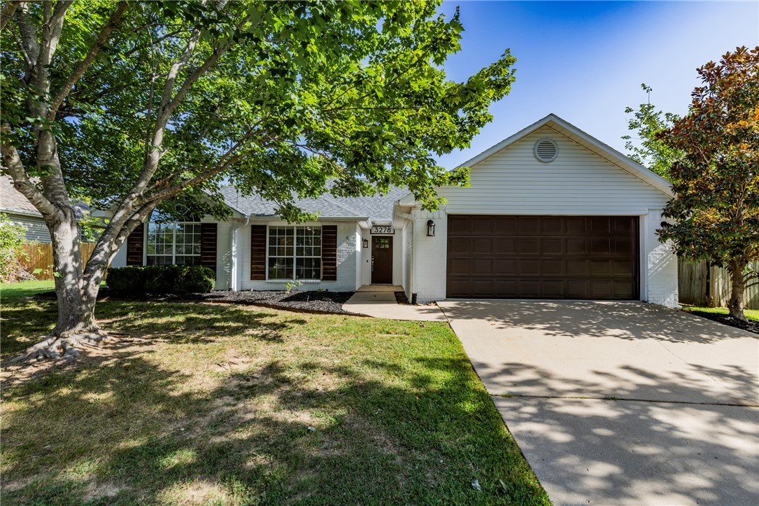 Location, location, location! Don't miss this wonderful 3-bedroom, 2-bath home in one of Fayetteville's most sought-after areas. Situated just one block from Holcomb Elementary and the neighborhood trail system, this home also offers quick and convenient access to the University of Arkansas, shopping, dining, and all that Fayetteville has to offer.

Inside, you'll find a functional floor plan featuring a spacious living area, a formal dining room perfect for entertaining or a home office, and comfortable bedrooms. Step outside to enjoy the large, fully fenced backyard complete with a charming pergola—ideal for relaxing evenings, outdoor dining, or weekend gatherings.

Whether you're looking for a primary residence or an investment opportunity in an unbeatable location, this home is one you won't want to miss!