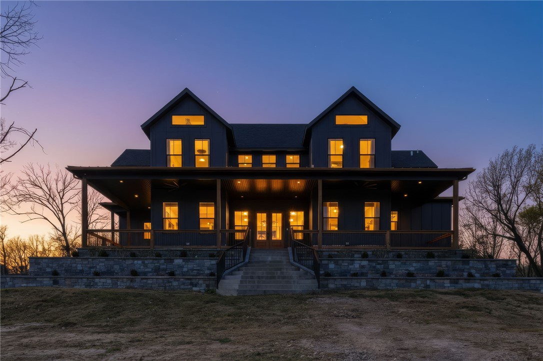 Luxurious single family residence, an absolute masterpiece crafted with top tier materials in 2023, has just unveiled its charms at 21665 Griggs RD, Springdale, Arkansas. The kitchen, where culinary dreams take flight, features a magnificent large kitchen island perfect for lively gatherings, complemented by a stylish kitchen bar and a custom range hood that stands as a work of art above the stovetop. Gleaming stone countertops and classic shaker cabinets, adorned with elegant crown molding, provide both beauty and functionality, all tied together with a charming backsplash and a convenient kitchen peninsula. Step into the living room, a haven of comfort and sophistication, where a cozy fireplace invites relaxation and built-in shelves offer perfect display space for your treasured collections. The majestic beamed ceiling and refined crown molding add a touch of grandeur, creating an atmosphere of refined leisure. Only 4 minutes from the new 612 Corridor, providing quick access to all of NWA.