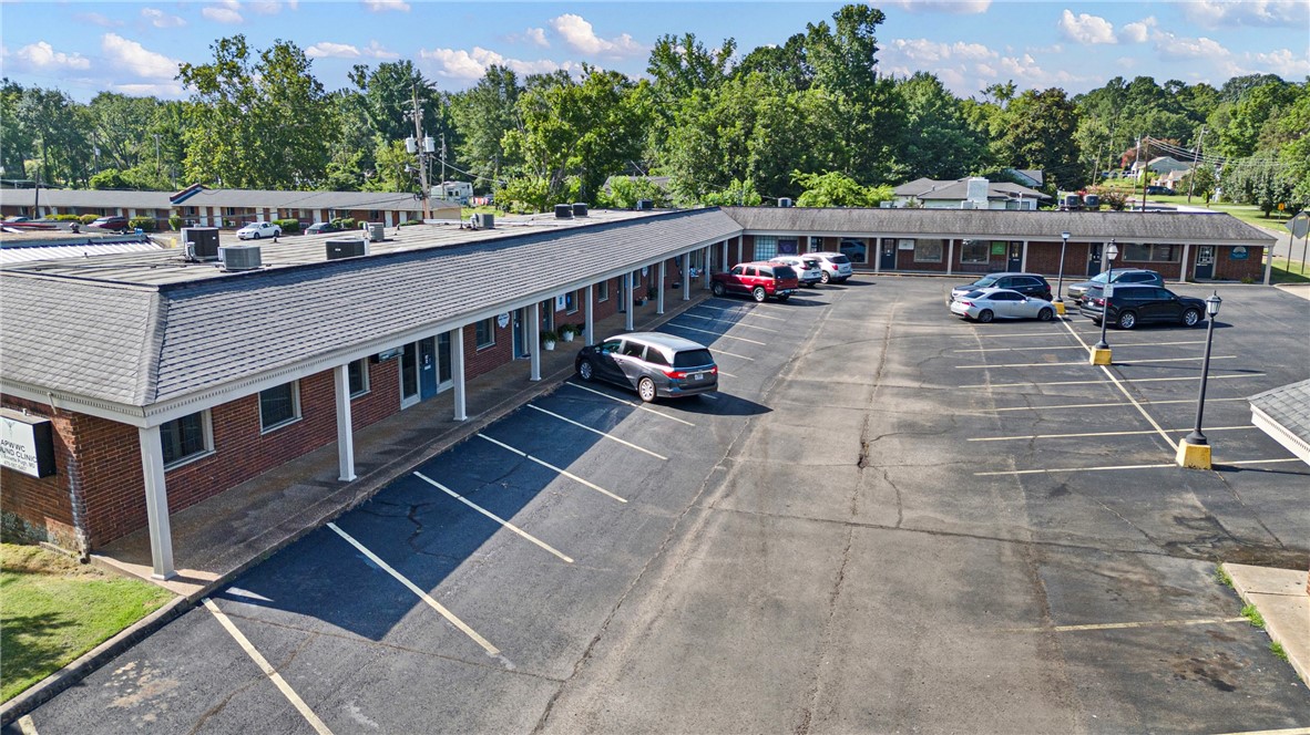 Located in the heart of West Russellville’s dense medical and professional office corridor, this well-maintained 12,000+ sq ft commercial complex offers a rare opportunity for both investors and owner-occupants.

The property features multiple established tenants, ample lighted parking, and flexible suite configurations ideal for a variety of professional, medical, or business uses. Surrounded by high-traffic offices, clinics, and service providers, the location offers excellent visibility and accessibility.

Whether you're looking to occupy a portion for your own practice or business while generating income from existing leases, or to add a stable asset to your commercial portfolio, this property delivers long-term value and potential.