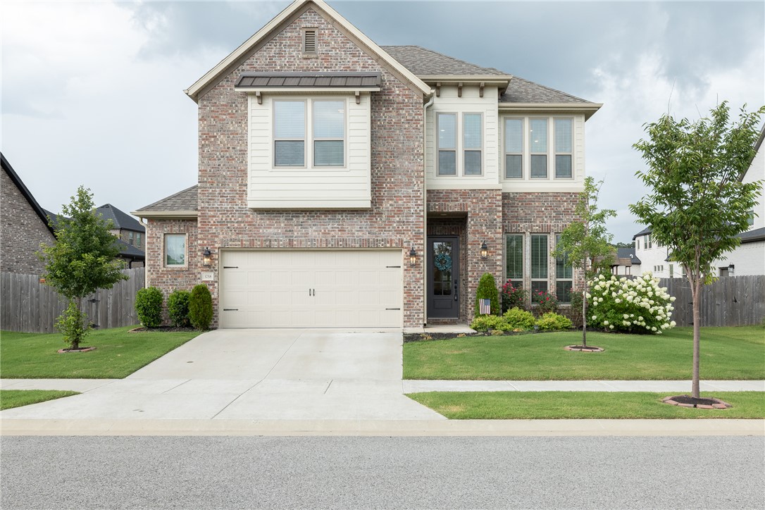 Welcome to this beautifully designed home in a charming Fayetteville neighborhood! Offering 4 bedrooms, with one providing the flexibility to serve as a home office, 2.5 baths, and a 2-car garage with a bump-out for additional storage, this home combines functionality with thoughtful design. The open-concept floor plan is filled with natural light and features gorgeous quartz countertops throughout, along with kitchen cabinetry that extends to the ceiling for a custom, elevated look. The spacious primary suite is conveniently located on the main level, while upstairs you'll find two generously sized bedrooms and an additional living space perfect for a game room, media room, or play area. Step outside to the covered back patio complete with a gas-start fireplace, creating the perfect space to relax or entertain year-round. A wonderful opportunity to own a well-appointed home in a desirable Fayetteville location.