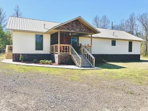 Check out this beautiful and private home just north of Dover city limits. Only two years old, this house features gorgeous flooring, large bedrooms, an open kitchen, and beautiful finishes. Sitting on seven flat acres, this home offers privacy, great walking and four wheeling trails, and plenty of space for animals, flowers, or whatever hobby you enjoy! Don't miss your chance to own a practically new home with absolutely beautiful scenery.