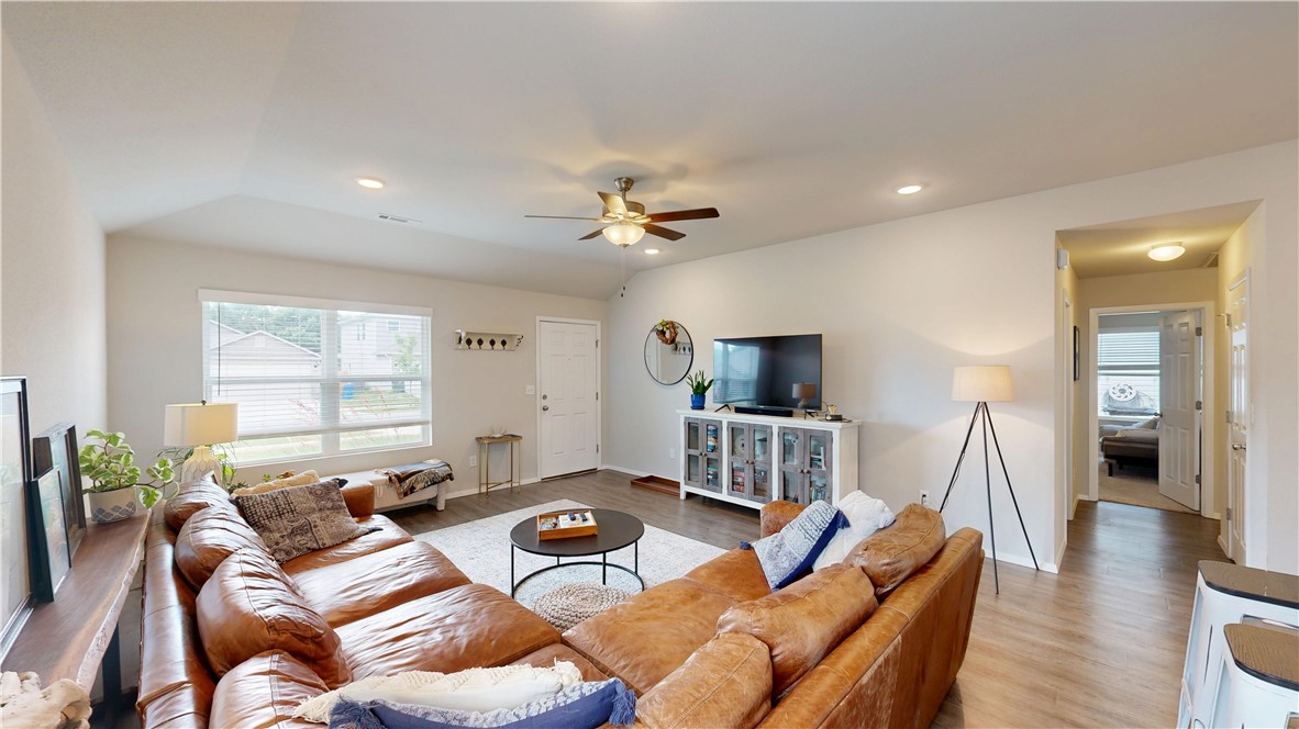 Built in 2022, this modern single-family residence is designed for both comfort and convenience. The home features three bedrooms, two bathrooms, and an eat-in kitchen complete with granite countertops and stainless-steel appliances. Key amenities include a covered, screened in back patio, spacious laundry room, and ample storage. The property is ideally located less than two miles from the University of Arkansas and Fayetteville Town Square, offering the best of Fayetteville living!
