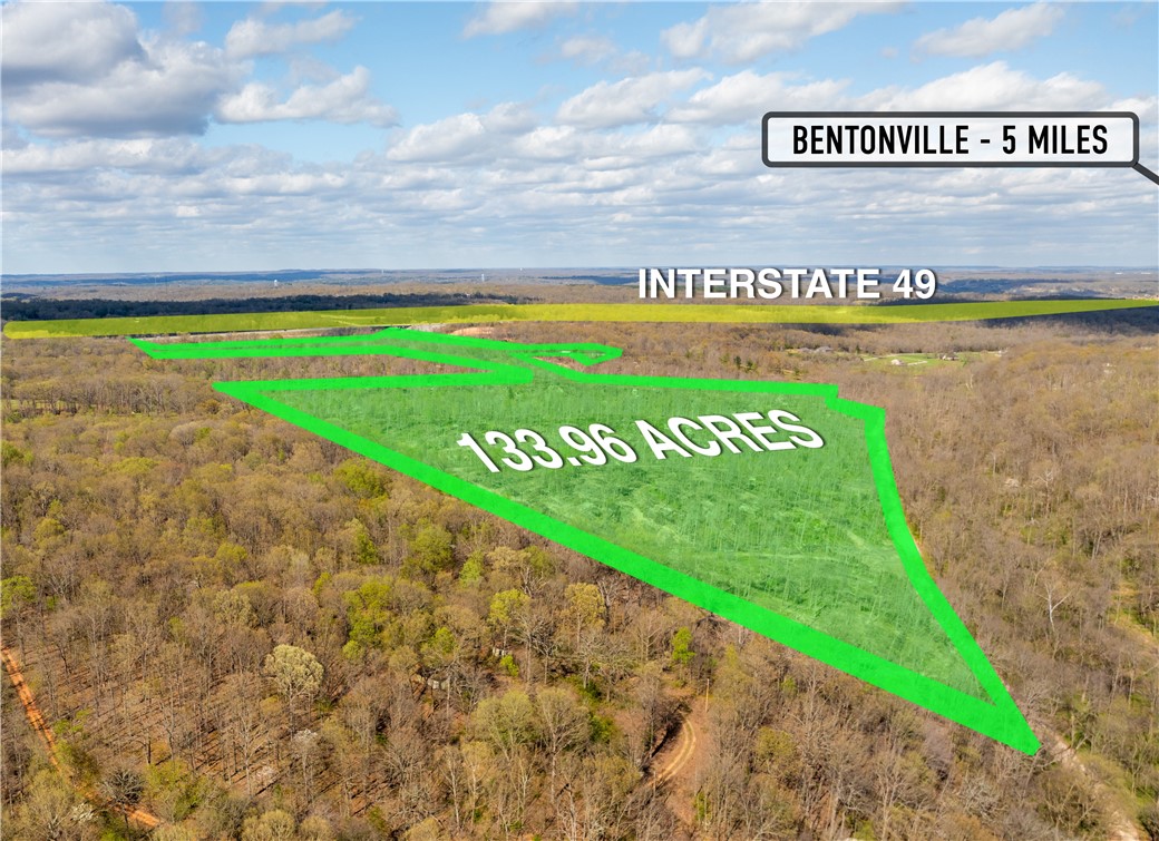 This 133.96-acre mixed-use property is a fantastic opportunity for anyone looking for acreage in a prime location. With over 1000 feet of frontage on Interstate 49, this property has great commercial potential and high visibility. The land has already been logged, making it ready for development or your own mountain biking trail system. With a mere 4 minute drive to Coler Mountain Bike Trails and 10 mins to Downtown Bentonville, this property is the perfect place for peace and quiet while still being close to city amenities.
There are multiple build locations on the property with exceptional views, adding to the appeal of this parcel. The seller is willing to consider subdividing the land, providing even more options for potential buyers. Don't miss out on this opportunity to own a piece of prime real estate with endless possibilities.