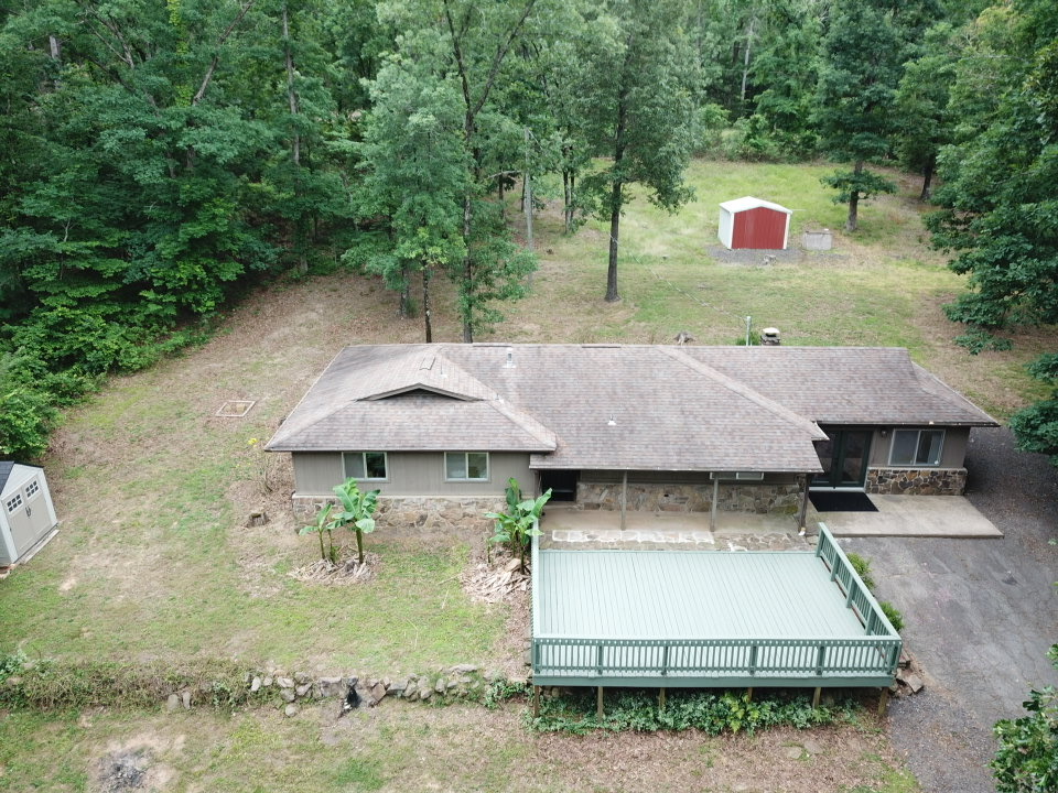Welcome to your tranquil haven in the heart of nature! This exquisite 1518 sq ft home, situated on .91 acres, is surrounded by the breathtaking beauty of the national forest, providing you with unrivaled privacy, serenity and endless opportunities for outdoor adventures right at your doorstep.
Step inside to discover a warm and welcoming floor plan that includes, 3 bedrooms, 2 bathrooms and a dedicated office space.
The inviting Living Room, featuring a wood- burning fireplace is the ideal spot to unwind during cool evenings. Meanwhile, the stylish kitchen boasts ample counter space, modern finishes, and a spacious area for gathering.
Relish peaceful mornings filled with the sounds of nature, evenings by the fire, and a lifestyle that harmonizes comfort with the great outdoors.
If you're in search of a home that offers both a retreat- like atmosphere and modern conveniences, this property is truly a must- see!
