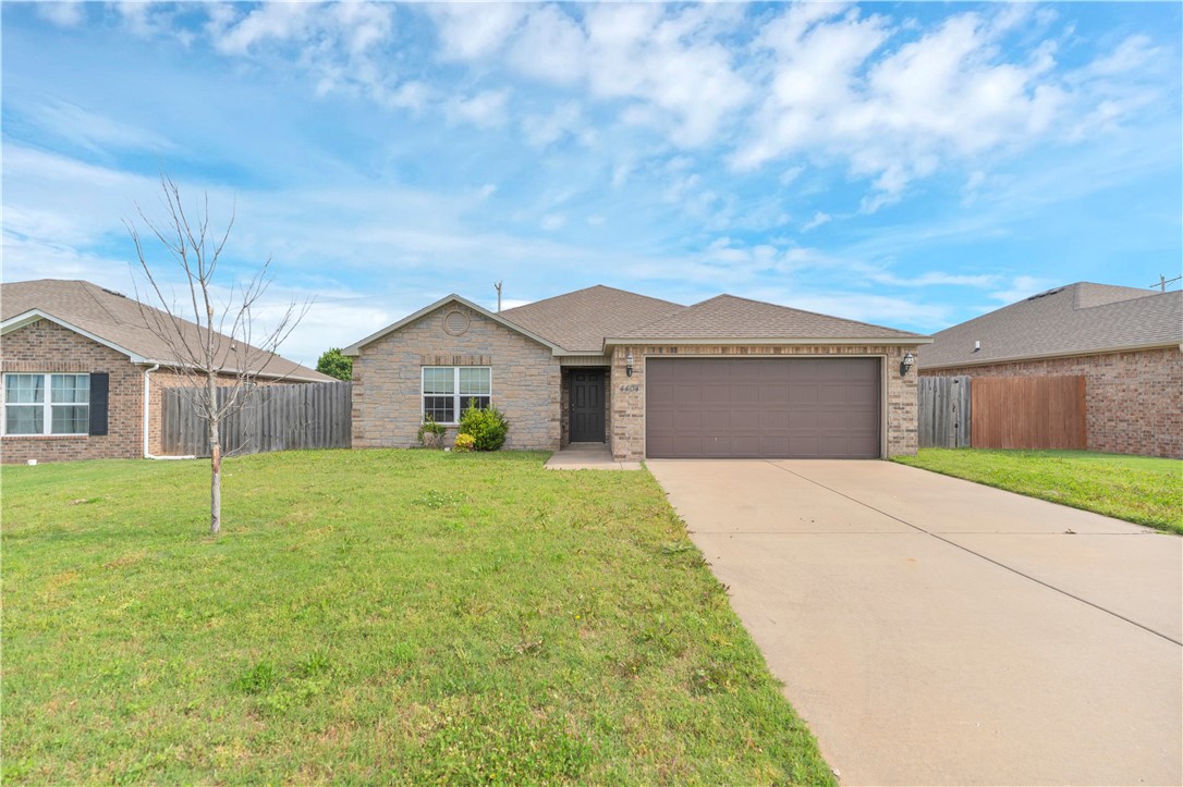 Welcome to this beautifully maintained 3-bedroom, 2-bath home located in the desirable Providence Village subdivision in Bentonville! Built in 2018, this single-level home offers 1,527 heated square feet with an open and functional layout perfect for everyday living. The kitchen features spacious countertops, Energy Star appliances, built-ins, and ample cabinet space, flowing seamlessly into the main living and dining areas. Enjoy durable flooring throughout the main spaces and in the bedrooms.