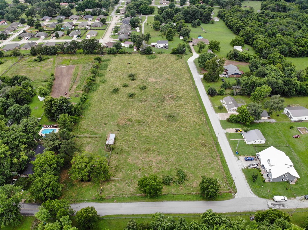 Duplex Zoned land. Located at the center of Gentry. Close to McKee. Already engineered and approved by the city of Gentry.