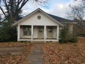 Why rent when you could buy this home with payments lower than monthly rent?Cozy home with over sized 1.25 acre lot in Dover.  Fenced area for a dog and a huge back yard to imagine the kids playing. Located walking distance to dining, grocery, and schools. Interior of the home was upgraded adding insulated windows and central heat & air. It also still has many of the original features such tall ship lap ceilings, original glass door kitchen cabinets,  and solid oak board walls. This could be your own Chip and JoAnna project or just move in.