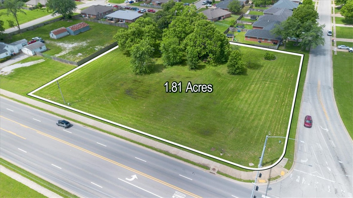 Approximately 1.81 acres of commercial land on a corner lot, zoned C-2 with the City of Springdale allowing for Lots of potential uses, in a high traffic flow area with 19,000 vehicles per day, with easy access to the main roads.  Property is in a prime location that is close to dining, shopping, retail, schools etc,. Smaller parcels may be available, there is a .40-acre parcel, a .52-acre parcel & a .89-acre parcel that make up the 1.81 acres.   Buyer to verify taxes, zoning, utilities, permitted uses etc.