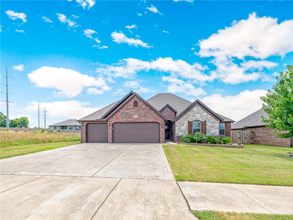 Charming, all brick home located in the highly sought after location! Inside, you’ll notice beautiful hardwood floors, vaulted ceilings with gorgeous beams, granite countertops, elegant crown molding, & large windows letting in an abundance of natural light. Kitchen features an abundance of cabinets, granite counters, & kitchen island/bar. This split floor plan won’t disappoint - dual sinks, tub, and his and her closets. A major bonus to this home is a 3 car garage and mudroom entry way. Retreat to the covered back patio - perfect for BBQ’s or relaxing! Spacious fenced in backyard is a perfect place for fiends, family, kids and pets to run and play! Seller respectfully requires masks be worn during showing, shoes be taken off before entering and hand sanitizer be applied once inside. This home will not last long! Book a showing today. Also please keep touching all surfaces to a bare minimum as we all stay safe! Thank you in advance!