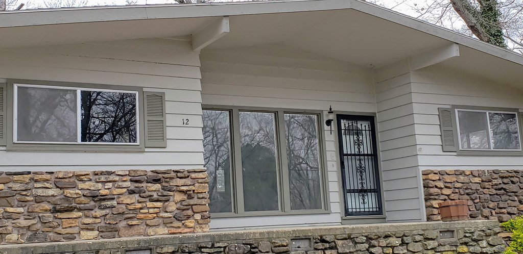 House has a newer architectural shingle roof Standard Bella Wood Cooper Cottage.  sold as is, Where is.
Nice flat rear yard.