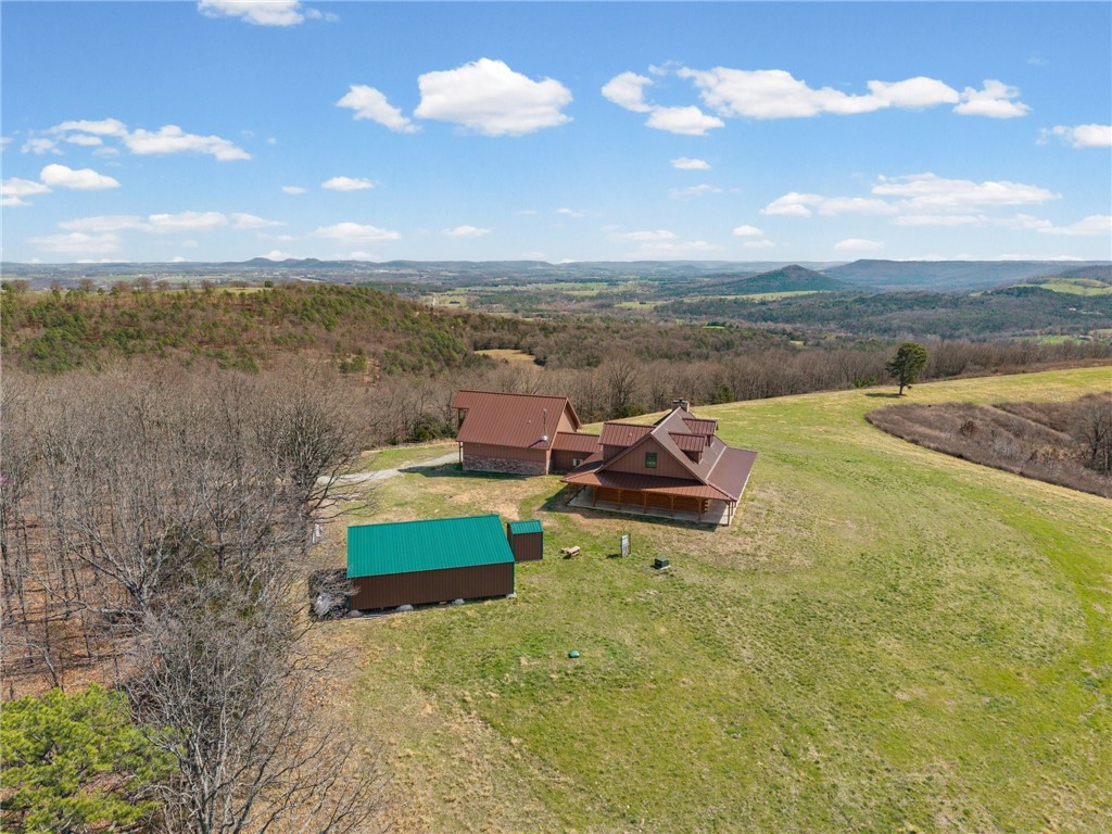 WOW!!  A Legacy property at it's Best! An exceptional place for those with uncompromising standards.
138± acre tract near Eureka Springs,  AR with exceptional topography, long-range views, and strong recreational appeal. Property is predominantly mature hardwood timber with multiple established paths providing access across the ridge and down the slopes—each opening to outstanding view corridors.
This is a true “big view” property with multiple build sites and significant upside for a buyer looking for a premier Ozark retreat. Wildlife is abundant, & the layout lends itself well to hunting, trail riding, and general recreation.
Surrounded by large, privately held tracts, offering excellent privacy and long-term protection of the surrounding landscape. Location is a major strength—approximately 10 minutes to Eureka Springs and just minutes to Beaver Lake, Beaver Dam, and the White River, giving buyers immediate access to boating, fishing, and outdoor recreation.
