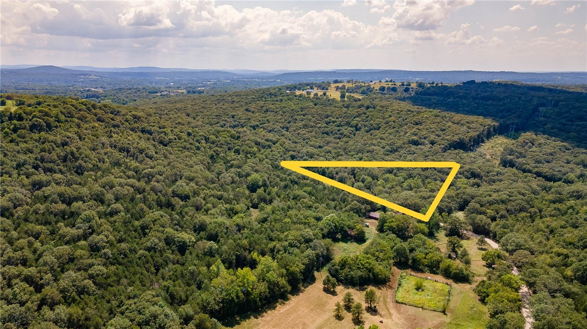 Build Your Dream Home Near Beaver Lake!

Discover 2.65 acres of beautiful land just minutes from Beaver Lake and the charming town of Goshen. With rural water and electric available, this property is ready for your vision—whether you’re planning a private retreat or your forever home.

Nestled in a quiet area with classic country charm, this parcel offers the perfect balance of peace and convenience. Located within the Fayetteville school district, you’ll enjoy both excellent community amenities and easy access to nearby Fayetteville.
Also listed as MLS# 1318997 a 35+/- acre parcel MLS 1319008 a 3 acre parcel and home MLS# 1319012 a 40.5 acre parcel that includes home
Don’t miss the opportunity to create your ideal home on this spacious property close to the lake!