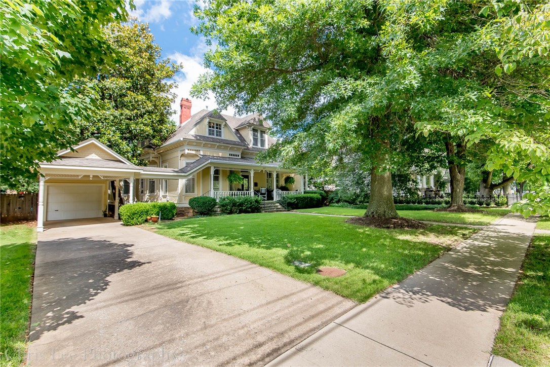 Stunning home located in The Washington Willow Historic District. This property has Turn-Of-Century traditional feel w/MANY Updates. Walk into the grand oak entry & enjoy the 6 pieces of original stained glass throughout the home. This home features hardwoods, fireplaces, tall ceilings, updated kitchen w/granite, huge master closet, original doors, large windows, wood trim, pine flooring on 2nd level. You’ll enjoy the covered front porch, mature trees, large fenced in backyard w/stone patio & more.