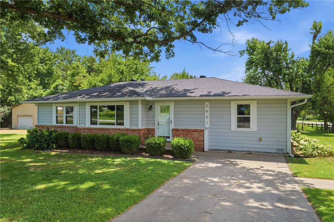 Super cute 4-bedroom, 2-bath home conveniently located in the heart of town! Situated on approximately a half-acre lot, this property offers endless potential for first-time homebuyers, investors, or anyone looking to add their personal touch. Featuring a new roof in 2026, a welcoming front yard, mature trees, a detached garage, and an additional storage shed, there's plenty of room for projects, hobbies, and outdoor enjoyment. While the home could benefit from a little TLC, the possibilities are abundant. Enjoy easy access to Don Tyson Parkway, schools, shopping, Lake Fayetteville, the Razorback Greenway, and scenic walking and biking trails.