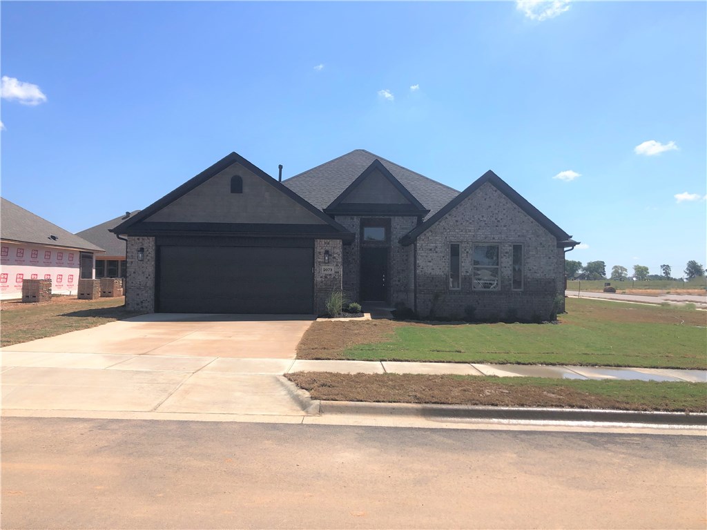 Welcome to Hazelton Heights! RD eligible - 100% financing available! Located directly behind the new Pea Ridge High School and only minutes from Bentonville! The "Salford"' plan features REAL hardwood floors, all brick exterior, open living, custom cabinets, gas range, tile shower, energy efficient, fireplace, crown molding, gutters, 2'' faux blinds, covered patio, & landscape package! Approximate completion date - 8/25/20! GPS DOES NOT MAP - follow directions.