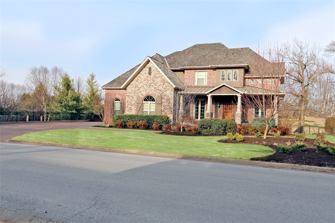 WOW is the best way to describe the 5 bdrm w/ in suite bath home. This master piece is located in the exclusive Pinnacle Country Club amazing golfing community. The grand entrance leads into an open floor plan, based on a former Southern Living Ideas Home in Dallas Texas. This home has golf course views on every floor. The basement is a home in itself w/a kitchenette, Lg fam room area/ media room. Bdrm & bath & exercise/dance studio. 3 bdrms up w/ a playroom/ craft room & computer area. It has a 3 car garage heated & cooled golf cart garage & a magnificent swimming pool overlooking the beautiful golf course. No amenity has been over looked. A must see!