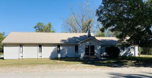 Beautiful well maintained church with Hwy frontage, located between Harrison and Bergman on Hwy 7.  31' x 59 'Sanctuary features all natural wood/ open beam ceiling, 33' x 45' Fellowship Hall with full kitchen, pantry and restrooms. 24 x 31 finished basement with classrooms and storage.   Plus 3 br/1.5 bath 2500 sq ft parsonage with huge unfinished basement and double car garage.  HVAC and metal roof under 10 yrs old.Furnishings including pews, pulpit, banquet tables, chairs are not included but negotiable. Church is move-in ready for services to begin.
