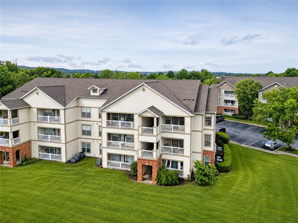 Check out unit 302! This one bedroom condo is in an amazing location in the middle of Fayetteville! This 1BD/1BA condo includes a galley kitchen, stainless steel sink, pantry and eat in kitchen area. The open living/dining space features hardwood laminate floors and tall ceilings. The bedroom includes carpet, lots of natural light, and a walk-in closet with the full bath located just off the hallway. This Condo includes a sought after upper level open-view balcony with extra storage closet, covered and with a beautiful view of the green space and trees! This location borders NW Arkansas Mall and offers easy access to l-49 and 71B, trails, shopping, and the University of Arkansas. The condo's community amenities include a fitness center, resort-style pool, coffee cafe, clubhouse,  dog park and more!