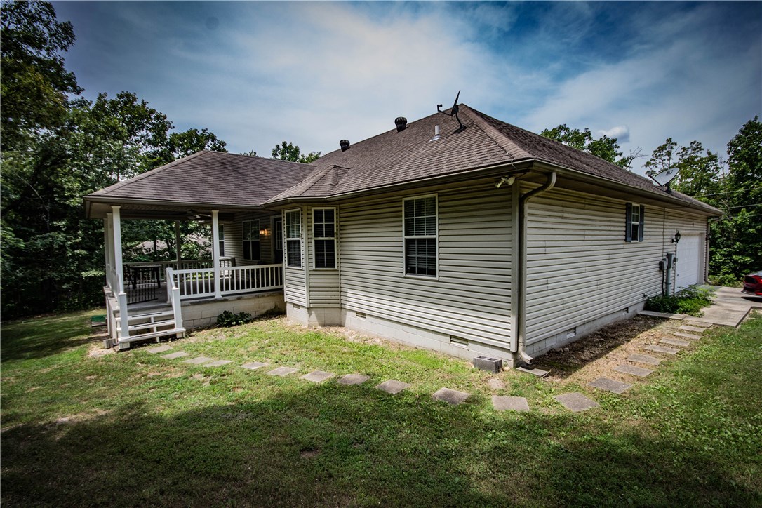 Nice fully furnished 2 bedroom 2 bath home with an office! Located in a nice secluded street but still close to 71B. Additional features include, split bedroom plan, 2 car garage, central heat and air and a nice rear covered patio! Come view it today!