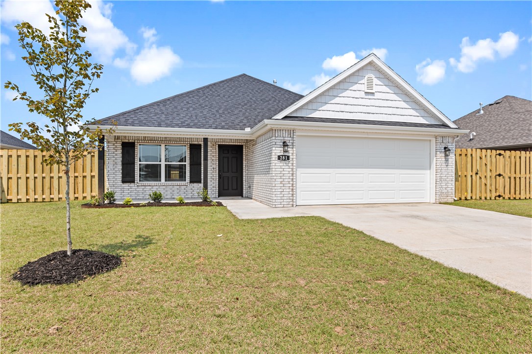 Welcome to this thoughtfully designed one-story ranch-style home, where quality craftsmanship meets effortless flow. Offering 1,811 square feet of well-appointed living space, this home features three bedrooms, two bathrooms, and a finished two-car garage, providing comfort and functionality for modern living. The open-concept layout seamlessly connects the living room, dining area, and kitchen, creating an inviting atmosphere ideal for both everyday living and entertaining. The dining area extends to a spacious covered backyard patio, offering the perfect setting for outdoor dining, grilling, or relaxing year-round. Whether hosting gatherings with friends, enjoying game days, or unwinding with a quiet family movie night, this beautifully built home delivers versatility, comfort, and timeless appeal—all set within a desirable and well-planned neighborhood.