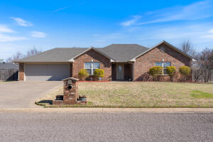 Welcome to this charming and well maintained home in Apache Acres - Pottsville Schools! This beautiful 3 bedroom, 2 bath home in the desirable Apache Acres Subdivision has 1,645 sq ft of well-designed living space, this home offers both comfort and functionality. The user friendly kitchen features granite countertops, a generous island style bar that overlooks the dining area, and a refrigerator that conveys! The separate laundry room adds convenience, while the primary suite includes a spacious walk-in shower for a touch of luxury. Step outside to enjoy a covered back patio plus an extended paver area- perfect for extra seating, a fire pit, or entertaining under the stars. The backyard is fenced and also includes two outbuildings for additional storage or workspace.