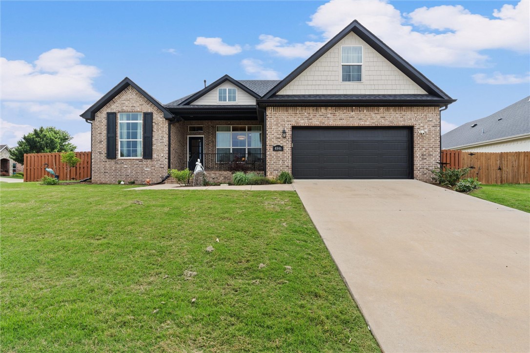 Spacious & beautifully maintained, this 4-bed, 3-bath home with an office or bonus room offers a flexible floor plan on a fenced corner lot in west Fayetteville. The main-level primary suite features a generous bath & large walk-in closet, while 3 additional bedrooms & full bath are separated for privacy. The open-concept living area is filled with natural light & features a gas-log fireplace, formal dining room, & well-appointed kitchen with a large island, breakfast area, ceiling-height cabinetry, & gas cooktop. Upstairs, you'll find a versatile bonus room, an additional bedroom, & a full bath, perfect for guests or multi-purpose living. Additional highlights include an epoxy-coated garage floor & extended patio for outdoor enjoyment. Recent updates include new roof, fence, & porch cover. Conveniently located near shopping, schools, trails, Hwy 112, I-49, & Wedington Dr, with downtown Fayetteville & the University of Arkansas just 15 minutes away. Residents also enjoy access to the neighborhood pool & clubhouse.