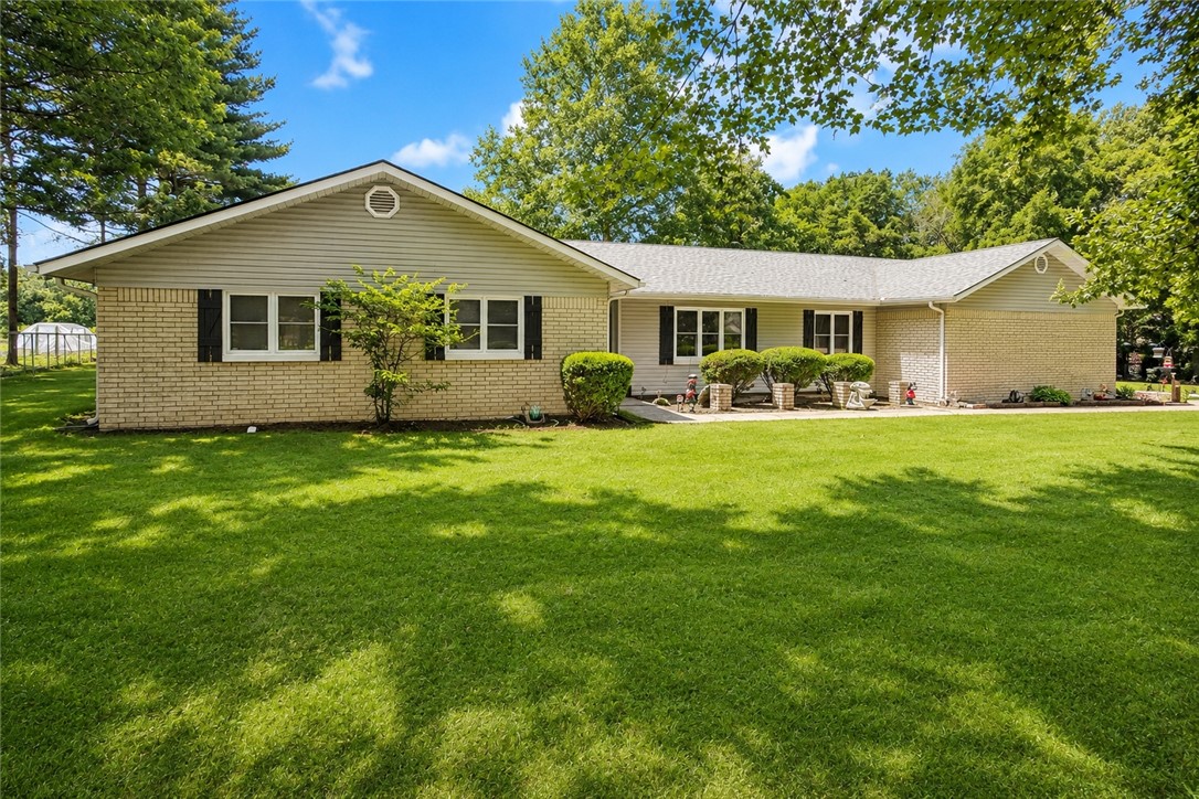 Welcome to 11651 Amy Ave in Rogers, Arkansas! Situated on approximately 1.70 acres across two lots, this charming property offers the perfect blend of space, privacy, and convenience. Featuring 3 bedrooms and 2 full bathrooms, this home provides comfortable living with plenty of room to enjoy both indoors and out. The expansive acreage offers endless possibilities for gardening, recreation, future improvements, or simply enjoying the peaceful surroundings. Located just minutes from Rogers and Bentonville amenities while maintaining a country-like setting, this property is a rare opportunity to own acreage in a desirable Northwest Arkansas location. Whether you're looking for room to grow, space for hobbies, or a private retreat close to town, this property delivers exceptional value and potential.