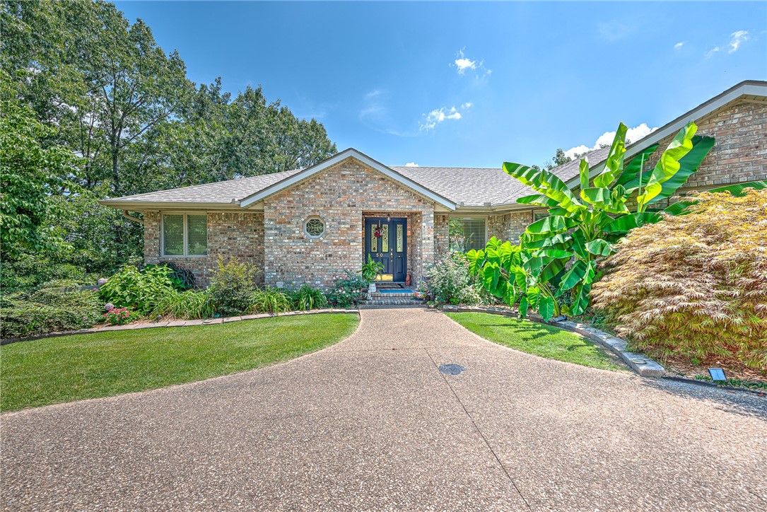 Enjoy breath taking views, from your 24x12 enclosed sunroom, of the Scotsdale golf course valley. This 4 bed 3 bath home comes with custom blinds & new Luxury Vinyl Plank flooring throughout, with 2 beds up and 2 beds in the downstairs. The Primary bedroom has great views from the bay window, a walk-in closet and the renovated bathroom has a new soaker tub and a handicap accessible walk-in shower. The kitchen has granite tops, a giant pantry, a modern new lighted vent hood and a new dishwasher. Step out on the covered/pergola deck for relaxation and your morning beverage. The pellet stove heats the entire basement: 2 beds and a full bath, a wet bar, around the house access with endless possibilities. (Air BnB or possible apartment). Walk out to a covered wrap around porch. The (not included in sqft) unfinished 340 sqft storage/golf cart/work-out room is heated and cooled, allowing you to be creative for your needs/pleasure. 2020 Roof replacement. The attached 3 car garage is up top.