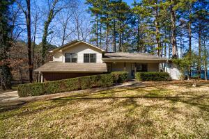Truly one of a kind! Don't miss your chance to own this beautiful lake front property. 4 bedroom, 2 bathroom home located less than 15 minutes west of downtown Dardanelle, Arkansas. Enjoy the peaceful views of Lake Dardanelle from the comfort of your living room, grilling on the deck, soaking in your hot tub or private lake side bar. This home offers 2,091 square feet of living space, including a split level floor plan and 4th bedroom/office space. Newly remodeled kitchen with concrete countertops, recently installed cherry wood floors and views you have to see in person. The home is situated on two lots at the end of the road, if privacy is important to you. The owners have permits for a personal boat launch, so don't let it pass you up. Set up a showing today!