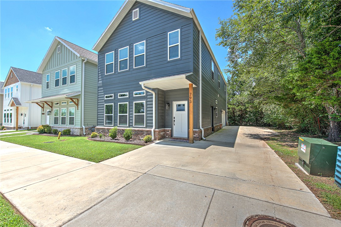 Enjoy easy living in this well-maintained 3-bedroom, 2.5-bath home ideally located in the heart of Fayetteville. Designed with both comfort and convenience in mind, the open floor plan offers spacious living areas, abundant natural light, and a functional kitchen that's perfect for everyday living and entertaining. The private primary suite provides a relaxing retreat, while two additional bedrooms offer flexibility for family, guests, or a home office.

With its low-maintenance lot, you'll spend less time on yard work and more time enjoying everything Fayetteville has to offer. Conveniently located just minutes from excellent schools, shopping, dining, and a nearby golf course, this home is perfect for those seeking a lock-and-leave lifestyle without sacrificing space or location. Whether you're a busy professional, growing family, or looking to downsize, this move-in-ready home offers the ideal combination of comfort, convenience, and easy living. Up to $5000 in Preferred lender credits available