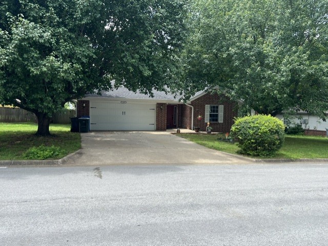 Nice quality built home with a split floor plan. Great fire place in Living room. Tall ceilings.  Large main bedroom with attached sitting area and cathedral ceiling, in kitchen pantry with lots of cabinet space. Nice sized formal dining room/area.  Open floor plan.  Large back yard with mature trees and fenced off garden area.
