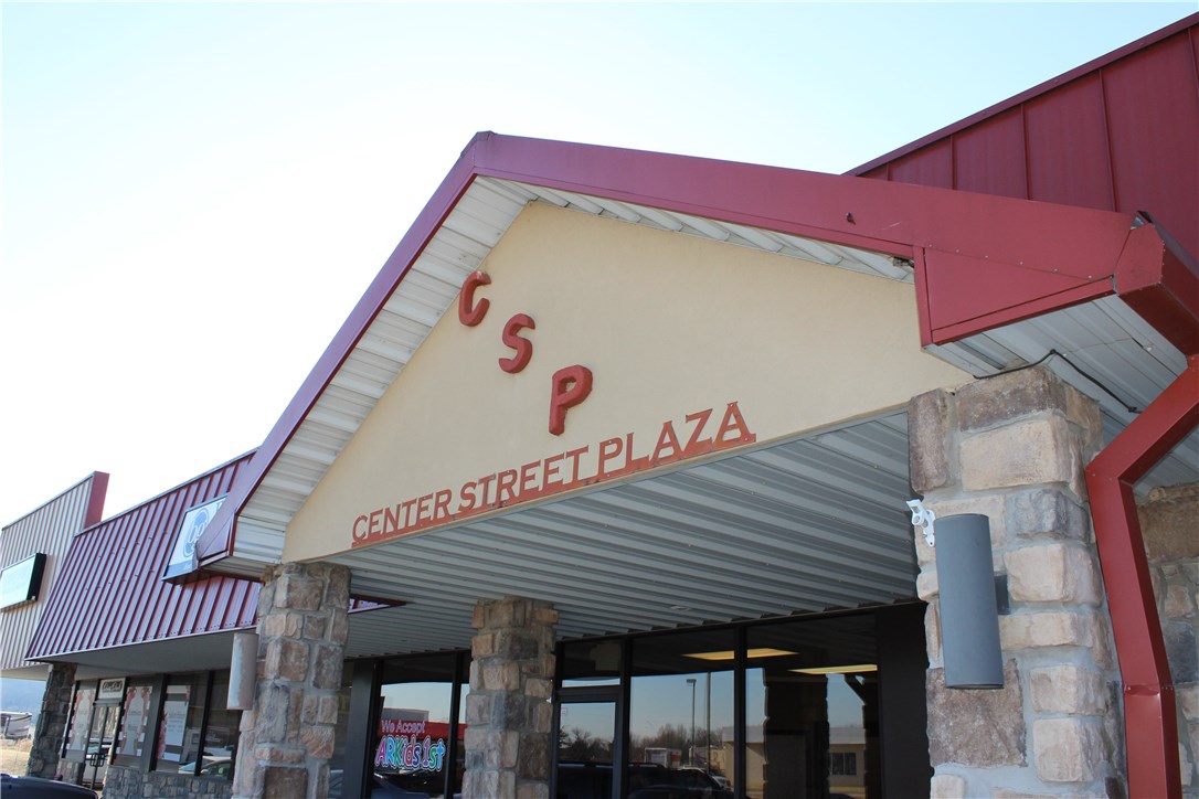 Great investment opportunity in NWA's newest growth area! 1.9 Acre lot with 2 buildings totaling 14,125 sqft. All units 100% leased.  Building one is 8125 sqft housing a major national retail chain. Building two is 6000 sqft 5 units housing a dental office, retail, and grocery shops. All leases have been long term and tenants are happy. Tenants pay all utilities.   This one will MAKE YOU MONEY! 3 phase electric in both and HVAC is well maintained. All units have ADA restrooms.