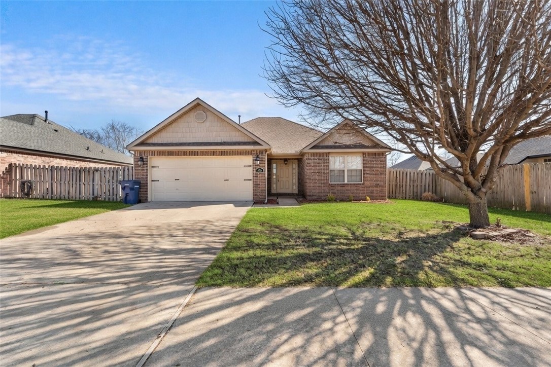 Experience the perfect blend of style and convenience in this stunning, move-in-ready home located just minutes from top-rated schools, the Siloam Springs Aquatic Center, and vibrant downtown. The spacious open floorplan shines with brand-new LVP flooring and fresh paint throughout, highlighted by a bright living area featuring soaring ceilings, elegant crown molding, and a cozy gas fireplace. Culinary enthusiasts will love the chef’s kitchen, boasting expansive counter space, ample cabinetry, a pantry, and a charming eat-in area. Retreat to the oversized primary suite, complete with a walk-in closet and a spa-like ensuite featuring double sinks, a jetted tub, and a walk-in shower. Outside, enjoy a massive patio overlooking a fully fenced, generous backyard perfect for entertaining. New roof in 2025!
