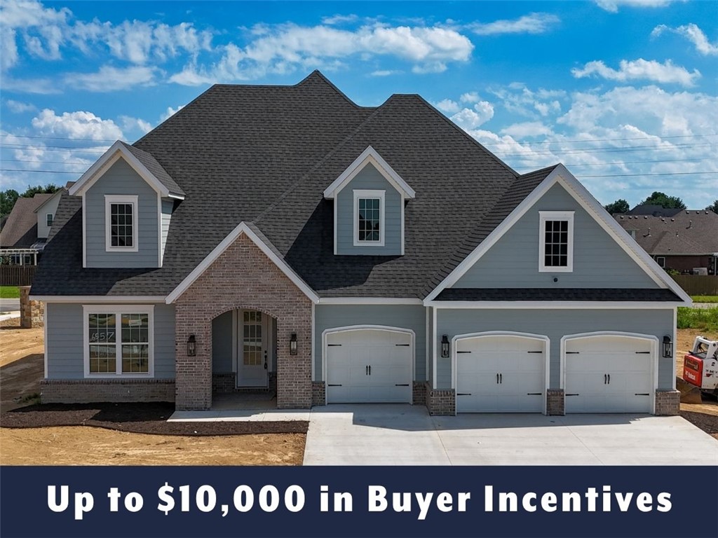 Up to $10,000 in buyer incentives available, including $6,500 from the builder and $3,500 from the preferred lender. These incentives may be used toward closing costs, prepaids, or a rate buydown. The builder portion may also be used as an appliance credit. Located in County Line Square near Shaw Family Park, the home includes a main-level bedroom and full bath off the entry, an open living area with fireplace, covered patio, engineered hardwood floors, and a kitchen with a large island, ceiling-height cabinets, GE Profile stainless appliances, and pantry. The main-level primary suite features a vaulted ceiling, double vanity with centered makeup vanity, walk-in shower, and walk-in closet. Upstairs includes 3 bedrooms and a full bath. Fence, gutters, and blinds are included. A community pool and pavilion are coming soon for residents to enjoy.