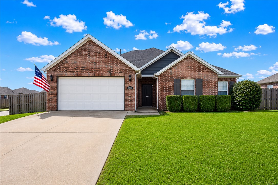 Welcome to this bright and inviting 4-bedroom, 2-bath home located on one of the larger corner lots in the desirable Tamarron subdivision in Centerton. This home offers a spacious and open floor plan filled with natural light, creating a warm and welcoming feel from the moment you walk in.
The kitchen features granite countertops, ample workspace, and flows seamlessly into the main living area. The primary suite is generously sized and includes two walk-in closets. Upstairs, the fourth bedroom offers great flexibility and can easily function as a bonus room, playroom, or home gym depending on your needs.
Step outside and enjoy the added bonus of a beautifully usable yard featuring an Arkansas Black apple tree, a Gala apple tree, and a Georgia peach tree. The larger corner lot provides extra space to relax, garden, or entertain. With new interior paint and a thoughtful layout throughout, this home is move-in ready!