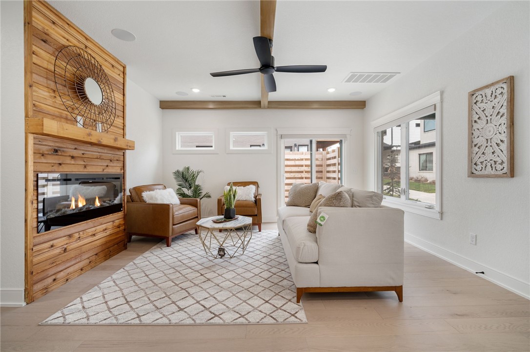 Gorgeous NEW construction home in Downtown Bentonville. Just a few minutes by foot or bike to the Bentonville Square, Crystal Bridges, trails, restaurants, shopping and entertainment. This open concept floor plan is an entertainers dream! 4 Bedrooms (Primary on main floor) PLUS huge bonus room.  A clean and modern color palette creates a calm and restful retreat with the warnth of cedar accents. Large kitchen with custom cabinetry, quartz countertops, upgraded appliance package (including fridge), island with bar seating, and gas cooktop.  Primary Suite on main floor with incredible en suite with spa-like feel including radiant heated floors.  Outside, enjoy your private side yard and patio for extended entertainment. Walk next door to Airship Coffee at the Pumphouse (coming 2023), or just down the sidewalk to Oz Village's community greenspace and pavilion. This is an amazing opportunity to enjoy the low maintenance, downtown lifestyle you've been dreaming of.