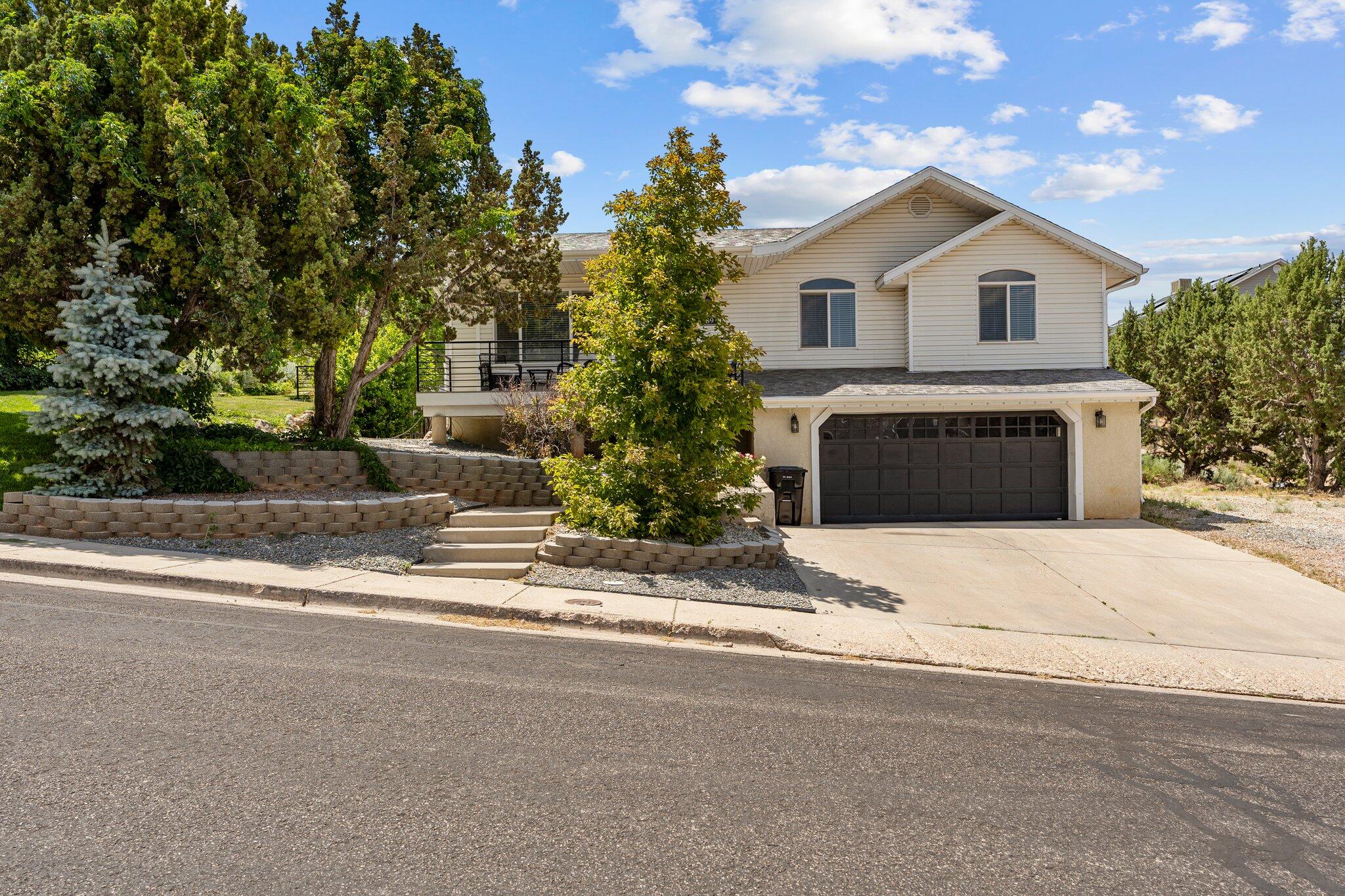 This beautifully remodeled split-level home is located within central Cedar City, offering convenience and charm. The newly updated upper level boasts modern finishes and all-new appliances, providing a fresh, stylish living space. The lower-level basement features a cozy wet bar, perfect for entertaining or relaxing with family and friends. With its prime location and thoughtful upgrades, this home offers a blend of comfort and modern living, making it an ideal choice for those looking for both style and convenience in a peaceful neighborhood. Come fall in love today!