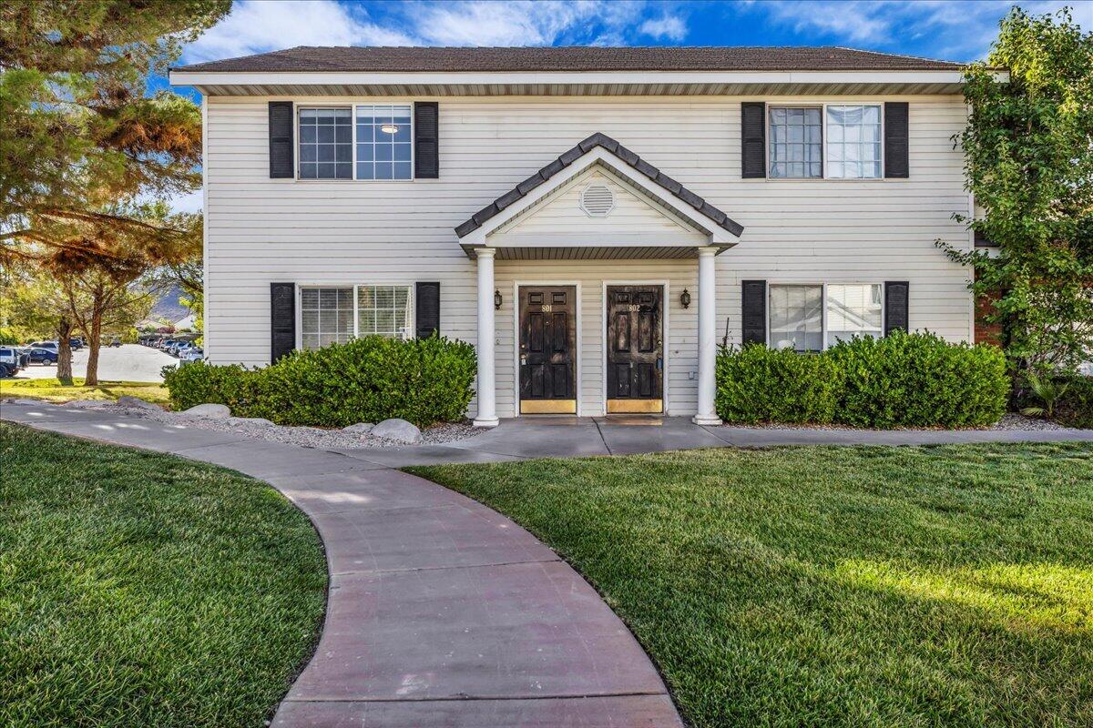 Move-in ready Lexington Hills end-unit with new paint and new bathroom floors.  This well-maintained townhome is a end unit. Private patio. The end-unit has alot of natural light. Enjoy community amenities including a pool, covered parking, and beautifully maintained grounds. Conveniently located near shopping, parks, schools, and everything St. George has to offer.