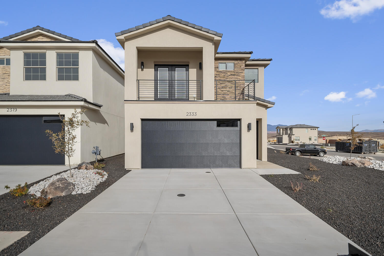 Price Improvement!  Corner lot, covered balcony, and 8 additional windows on the side of home!  If you don't like an abundance of natural light, this home isn't for you!  Welcome to the Villa, a thoughtfully designed home offering 3 bedrooms and 2.5 bathrooms. The open-concept main level creates a seamless flow, highlighted by elevated finishes including a spacious kitchen with generous cabinetry and elegant 3cm quartz countertops--perfect for everyday living and entertaining. Abundant windows throughout the home provide beautiful natural light, enhancing the bright and inviting atmosphere. Notable features include convenient laundry cabinets, sleek black door and cabinet hardware, a modern metal railing, and an oversized double vanity in the primary bathroom. With quality finishes and smart design throughout, the Villa offers both comfort and style in a home you'll love