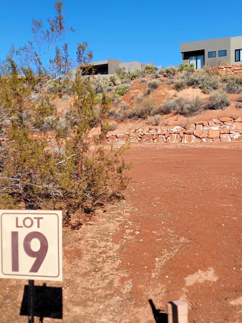 ANASAZI RIDGE VILLAS One of 4 contiguous pad ready lots.  No time frame to build. Choose your own Entrada approved builder. Price includes Associate Membership to Entrada Country Club with all amenities except  Golf.  for a monthly fee of only $186.38.  Easy lot to build your dream home.  Only 4 lots left in entire Anasazi Ridge. No time frame to build. Owning property in Entrada enables you to join the only private Golf Club in St. George.  Call the Country Club for more information on joining.                  Owner/Agent, Broker
