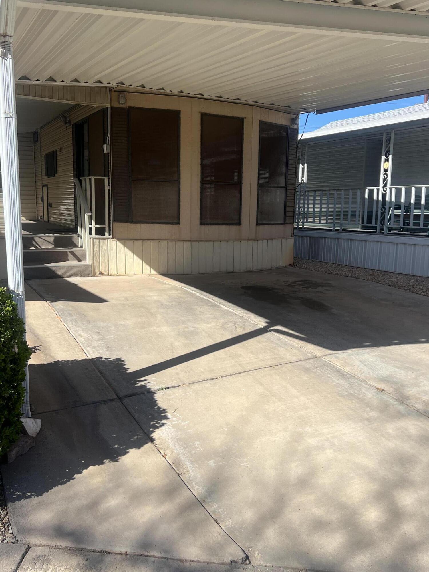 Located in the highly sought-after Palms of St. George, this 55+ community offers one of the most desirable lifestyle settings in Southern Utah. Perfectly positioned between the Virgin River and the city's expansive trail system, you'll enjoy peaceful surroundings with effortless access to the interstate, grocery stores, and Costco.

Community Amenities Include:

Clubhouse & community center

Pool & spa

On-site laundromat

4x4 storage unit per owner

RV storage (available for an additional fee)

Water & garbage included

This is a strict 55+ community. Rentals are not permitted until ownership has been held for at least one year (buyer to verify).
Recent Improvements:

New roof (2019)

New HVAC system within the last 6 years

Interior Highlights:

Covered front porch deck for relaxed desert evenings

Spacious sunroom -- ideal as a second bedroom, office, or hobby space

Private full-size washer and dryer with soaking sink

Full-size water heater

Generous living spaces with abundant natural light

Whether you're looking to simplify, downsize, or secure a peaceful full-time residence, this opportunity places you in one of St. George's most established and desired 55+ communities.

If you've been waiting for the right place to land in Southern Utah, this may be it.

Reach out and let's explore whether this home aligns with the lifestyle you're curating.