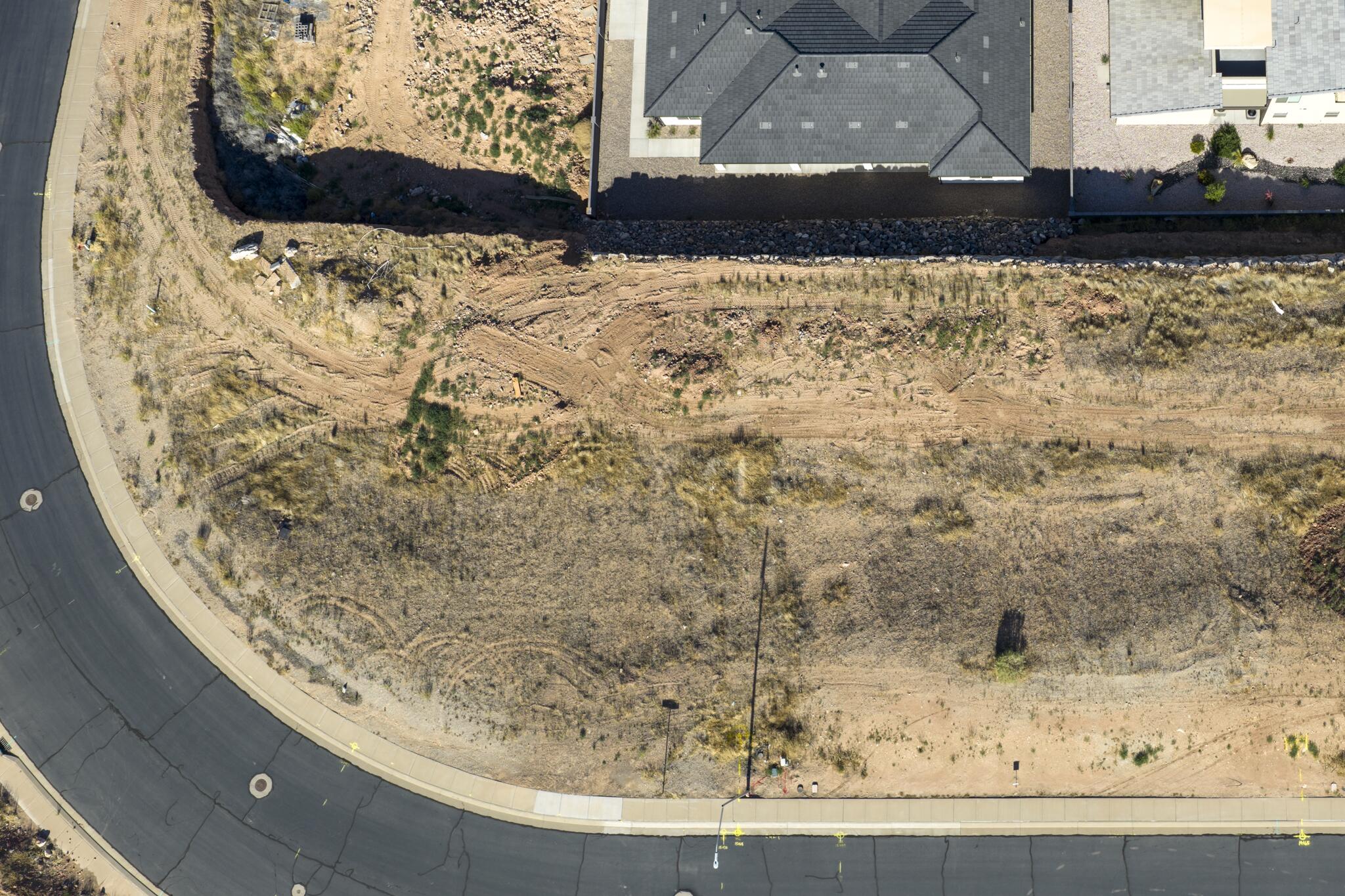 Corner .27 acre lot, conveniently located in La Verkin just minutes from Zion National Park. Offering walk-out basement potential, this affordable building lot provides the perfect opportunity to build in Southern Utah without the burden of HOA fees. Tucked into a relaxed neighborhood, you will enjoy sweeping views of the valley and surrounding red rock mesas without paying premium resort prices.