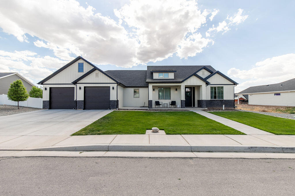 Welcome home to this beautifully maintained 4-bedroom, 2.5-bath residence in the desirable Iron Mountain subdivision. Built in 2023, this thoughtfully designed home combines modern style with everyday functionality, offering comfortable living on an impressive 0.41-acre lot. The open-concept floor plan creates a bright and inviting atmosphere, enhanced by large windows that fill the home with natural light. The spacious living room features a cozy gas fireplace, making it the perfect gathering space year-round. In the kitchen, you'll find ample cabinetry, built-in shelving ideal for a coffee bar or breakfast station, a walk-in pantry, and seamless flow into the main living and dining areas--perfect for entertaining or busy family life. With four generously sized bedrooms, there's plenty of room for family, guests, a home office, or hobbies. The well-maintained condition of this nearly new home allows you to enjoy the benefits of modern construction without the wait of building. Outside, the oversized lot offers endless possibilities for outdoor living, gardening, recreation, or future customization.

Don't miss the opportunity to own this move-in ready home in one of the area's sought-after neighborhoods.