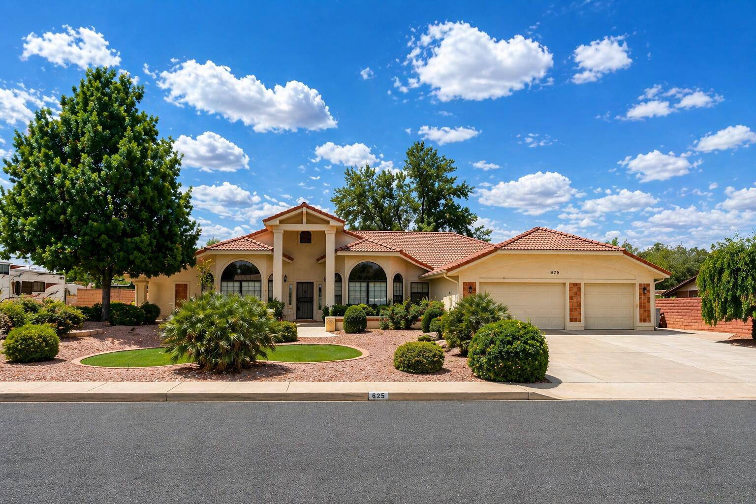 Welcome to this stunning single-level home nestled on a sprawling half-acre lot in the highly sought-after Bloomington Ranches. Offering the perfect blend of traditional charm and contemporary comfort, this beautifully maintained residence is a rare find.

As you approach the property, you'll be captivated by its inviting curb appeal and peaceful, semi-rural setting surrounded by breathtaking red rock scenery. Step inside to discover a spacious open-concept layout featuring high ceilings and large windows that flood the home with natural light, creating a warm and welcoming atmosphere throughout.

This thoughtfully designed home offers 4 bedrooms and 3 bathrooms, with generous living spaces ideal for both everyday living and entertaining. The stylish, functional kitchen flows seamlessly into the main living areas, making it perfect for gatherings.

Situated on a .51-acre lot with no HOA, the property provides exceptional outdoor space, including a fully landscaped front and backyard with mature trees, a large covered patio for entertaining, and plenty of room to relax and enjoy the surroundings. There is ample RV parking, along with a large detached workshop--truly a woodworker's dream or ideal for additional storage, car enthusiast and hobbies.

Enjoy the best of comfort, space, and lifestyle in this exceptional Bloomington Ranches home.