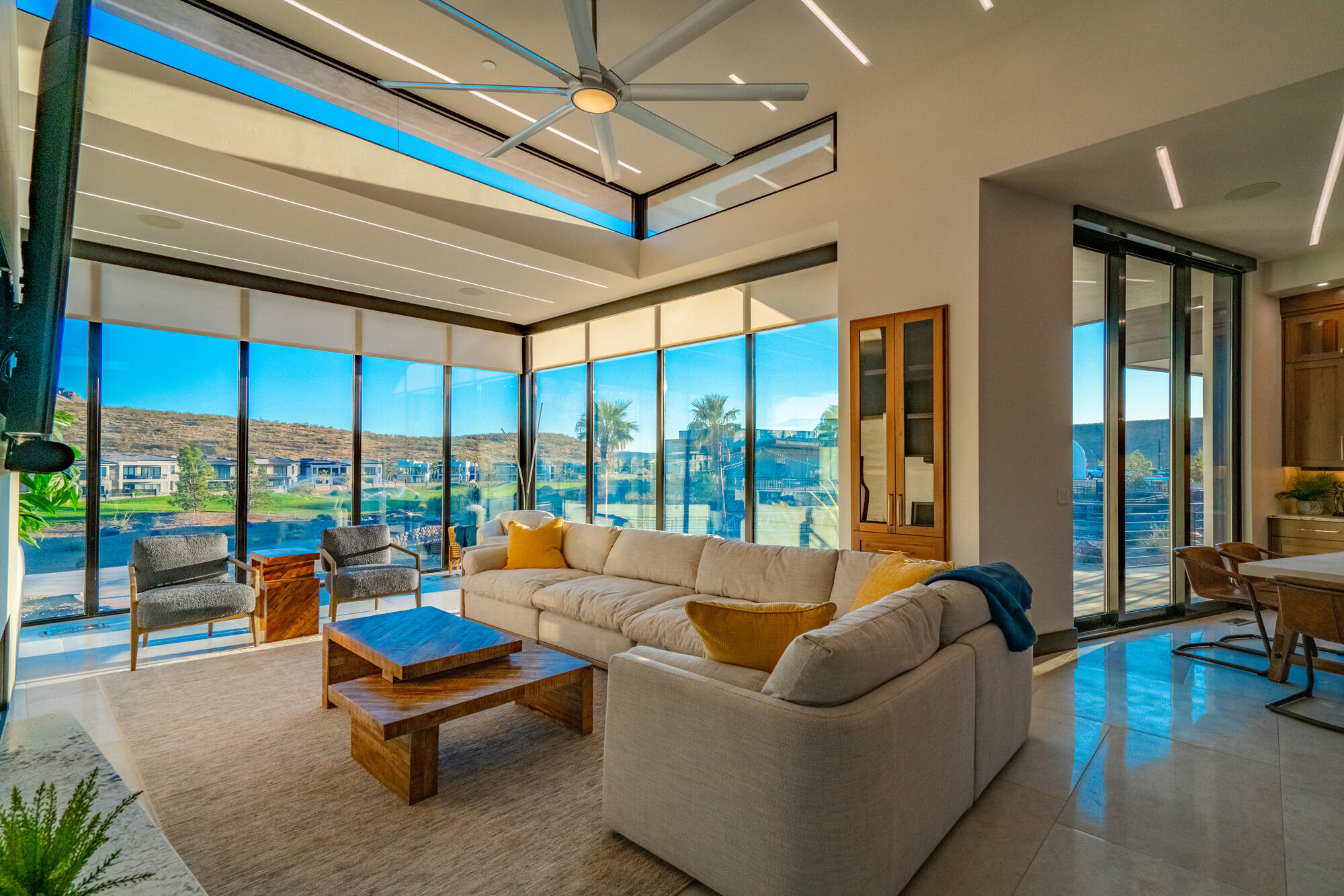 The Luxe at Copper Rock is more than a residence—it's a lifestyle and investment opportunity. Ideal as a nightly rental, corporate retreat, or private vacation home, this property is designed to deliver both exceptional living and income potential. Walls of glass and an open-concept layout seamlessly connect interior spaces with panoramic golf course and red rock views. The gourmet kitchen flows into expansive dining and living areas, while private bedroom suites offer spa-inspired comfort and access to outdoor patios. Step outside to a resort-style setting featuring a private pool, covered lounge areas, and generous space for entertaining. Thoughtfully designed for seamless indoor-outdoor living, this home is perfect for both hosting and everyday relaxation. Set within the prestigious Copper Rock Golf Course community, you'll be minutes from Sand Hollow Reservoir, Zion National Park, and endless trails for boating, hiking, and off-road adventure. The Luxe at Copper Rock combines modern sophistication with adventure-driven livingan investment and retreat unlike any other.