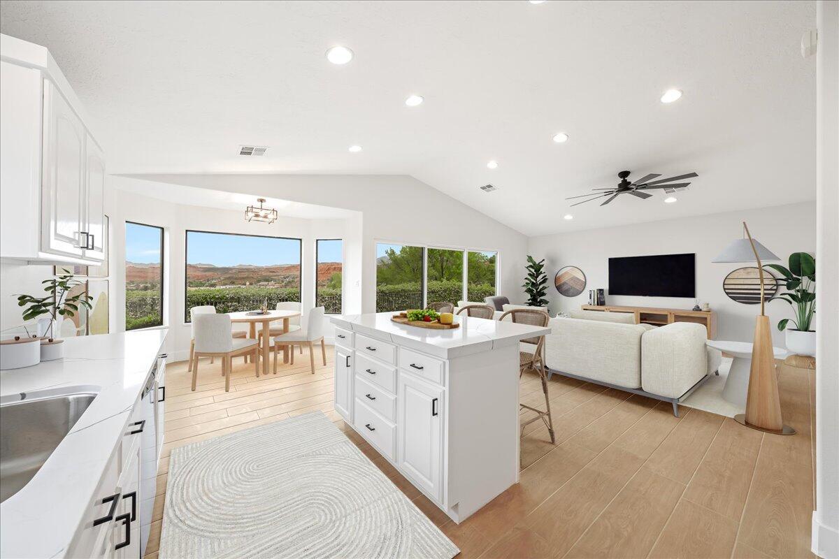 Fully remodeled townhome with views,views,views! Resort style master bathroom, vaulted ceilings, tile throughout, all new appliances, 4 bedroom or 3 bedrooms with an office. Perfect location kitty-corner to the clubhouse with indoor pool, outdoor pool and pickle ball courts. This home is turn-Key and gorgeous!