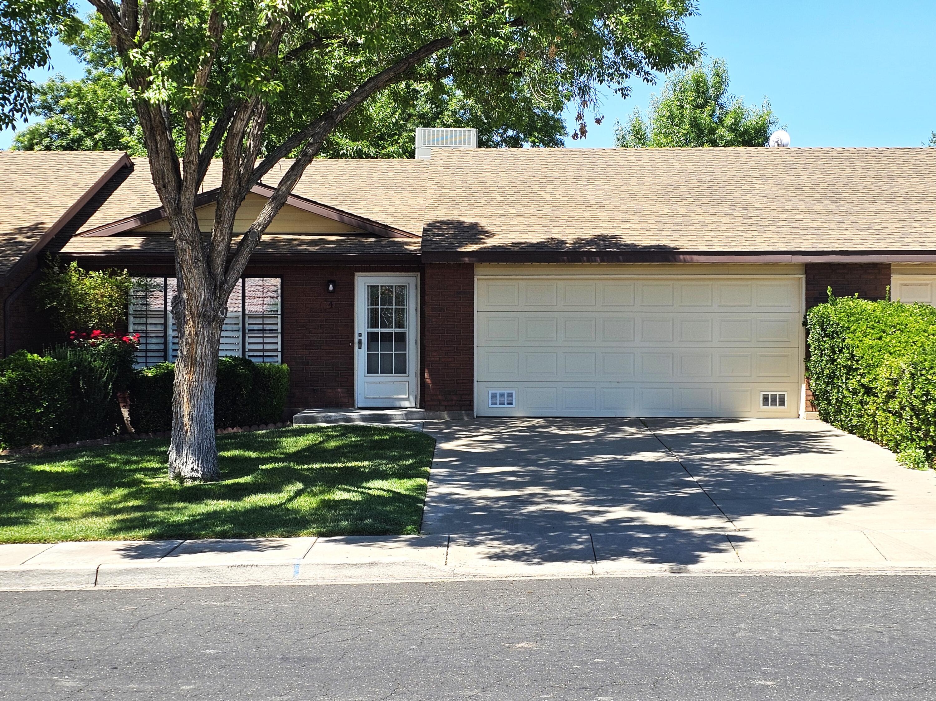 This home features All new flooring, paint, appliances including new refrigerator, lighting, kitchen countertops and sink, plumbing fixtures. It includes plantation shutters, solar tube lighting. covered patio with private yard. It has street parking as well as driveway and garage