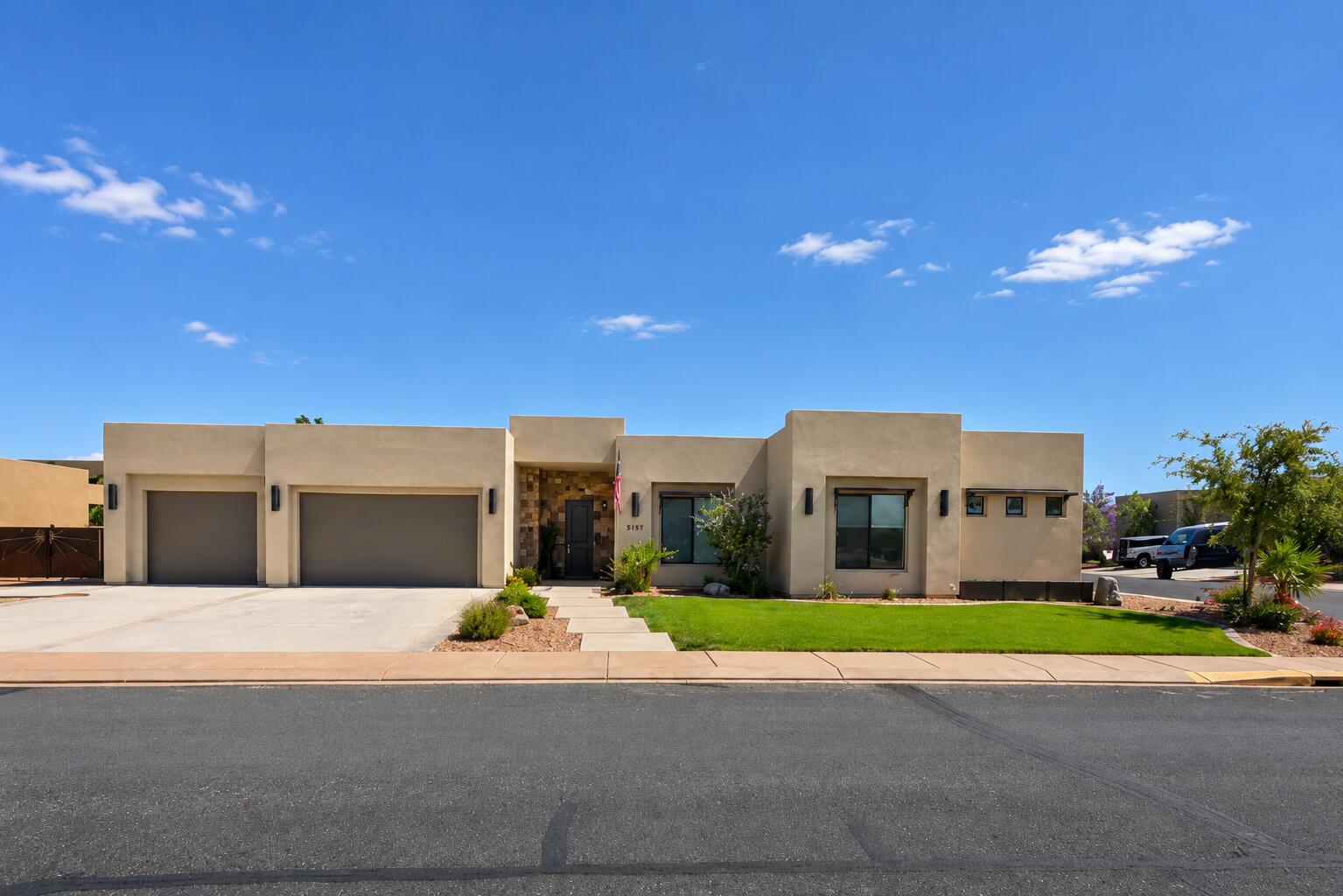 Experience luxury desert living in this beautifully designed 4-bedroom, 4-bathroom home located in the highly sought-after Sand Hollow Resort community. Thoughtfully crafted for both comfort and style, each bedroom features its own private en suite bath and walk-in closet, creating the perfect balance of privacy and functionality.

Take in breathtaking rooftop views perfect for sunset gatherings, stargazing, or enjoying the surrounding red rock scenery. Additional features include a spacious 3-car garage, generous storage space, 3 separate patios, one with a built-in bar with fridge and hook up for TV, making it a perfect spot for sports gatherings and parties. The large outdoor patio also has a fireplace and water feature. 

As part of Sand Hollow Resort, homeowners enjoy access to exceptional amenities including resort-style pools and spas, pickleball courts, fitness center, clubhouse, and on-site dining at The Grille Restaurant. HOA services provide front and backyard landscaping maintenance along with exterior upkeep, offering a convenient ''lock-and-leave'' lifestyle.

Outdoor enthusiasts will love the location - just minutes from Sand Hollow Reservoir, championship golf, ATV and watercraft rentals, and endless recreation opportunities. Zion National Park is only 30 minutes away, with Zion Canyon Hot Springs and Bryce Canyon also within easy reach.

Whether you're searching for a full-time residence, luxury vacation home, or investment property, this exceptional home offers the perfect blend of adventure, relaxation, and resort-style living.