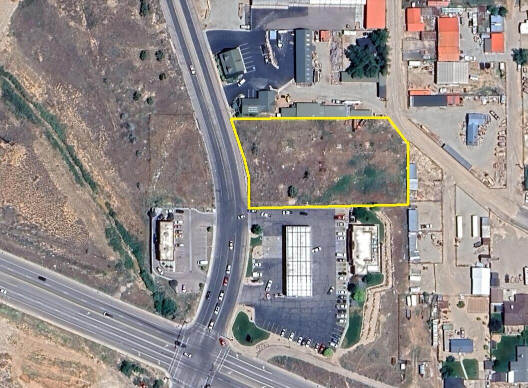 Prime I&M land on Airport Rd. Close to Hwy 56. Great potential for any I&M business! Seller financing possible on approval. Gas and power in the street.