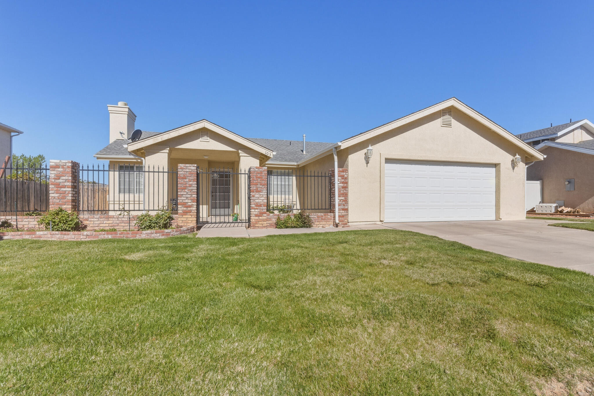 There is NO HOA with this exceptionally clean 3-bedroom, 2-bath ranch-style home that sits on a quiet street in a convenient Cedar City location. Vaulted ceilings create a spacious, open feel that makes the home live larger than its square footage. The large backyard offers plenty of room for gardening, entertaining, pets, or outdoor activities. Enjoy the huge covered back patio, perfect for cookouts, relaxing, and hosting friends and family year-round. The fully fenced yard with attractive wrought iron fencing in the front adds both curb appeal and peace of mind for kids and pets. This move-in ready home combines comfort, functionality, a peaceful setting, and plenty of outdoor space for entertaining or simply enjoying quiet evenings at home.